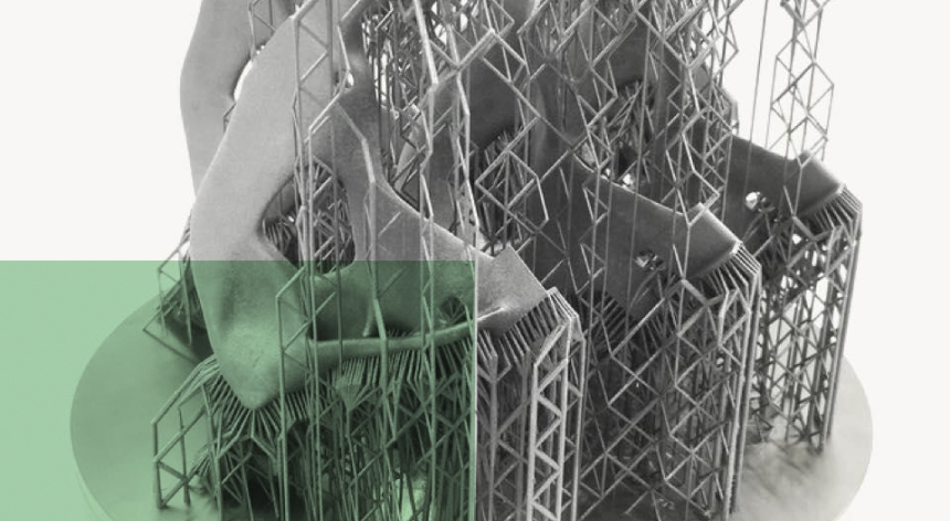 Black and white picture of a batch of 3D-printed pieces on their mount plate